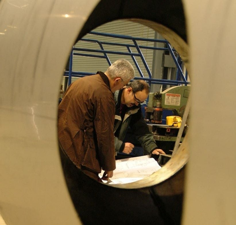 TEI engineers looking at technical specifications