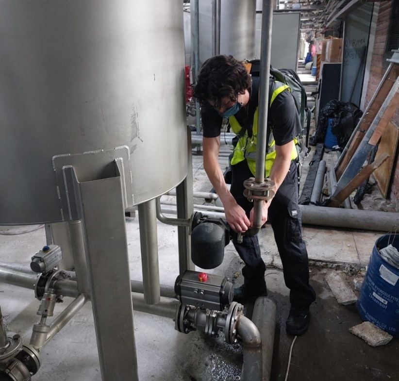 TEI engineer tagging a steam trap